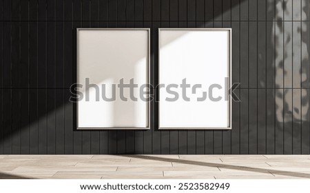 Two vertical empty frames on a black tiled wall with wooden floor, modern design background, concept of display and advertising. 3D Rendering
