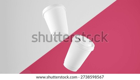 Two White coffee cups floating on diagonal Desire Pink and White background. blank coffee cups mockup.