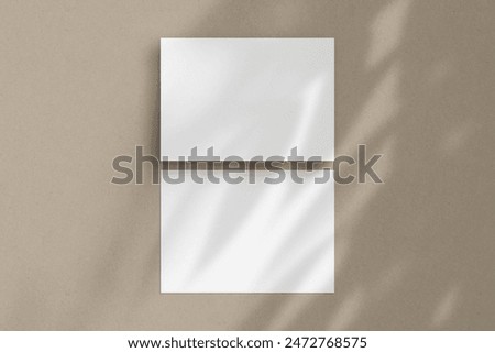 Two white horizontal paper sheets mockup, A4 A5 A6 flyer mockup, paper, letter, invitation card, on a beige background with a botanical shadow overlay.