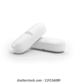 Two white pills isolated