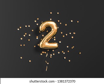 Two year birthday. Number 2 flying foil balloon and gold confetti on black. Two-year anniversary background. 3d rendering