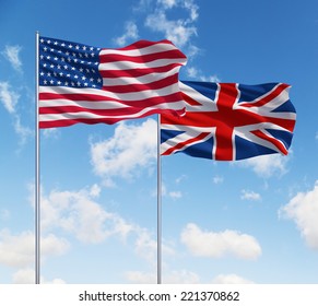 Uk And USA Flags On A Blue Sky Background.