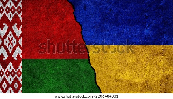 Ukraine and Belarus flag together on\
a textured wall. Relations between Belarus and\
Ukraine