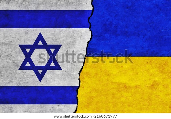 Ukraine and\
Israel painted flags on a wall with a crack. Ukraine and Israel\
relations. Israel and Ukraine flags\
together