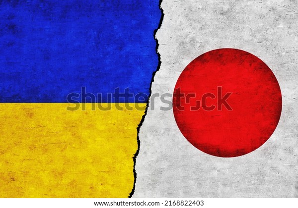 Ukraine and\
Japan painted flags on a wall with a crack. Japan and Ukraine\
relations. Ukraine and Japan flags\
together