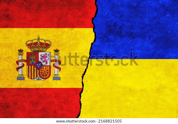 Ukraine and\
Spain painted flags on a wall with a crack. Spain and Ukraine\
relations. Ukraine and Spain flags\
together