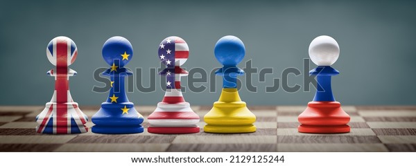 Ukraine, US, UK, EU and\
Russia conflict. Country flags on chess pawns on a chess board. 3D\
illustration.