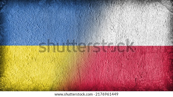 Ukrainian and Polish flag on concrete, divided in
the middle