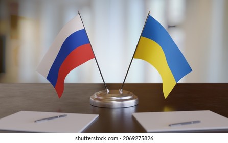 Ukrainian and russian flags on table. Negotiation between Russia and Ukraine. 3D rendered illustration.