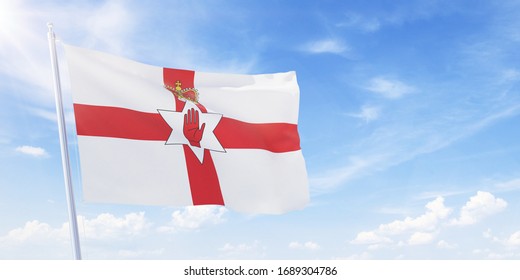 The Ulster Banner on a flagpole waving in blue cloudy sky. Northern Ireland concept 3D rendering