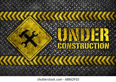 under construction hammer and wrench metal sign - Powered by Shutterstock