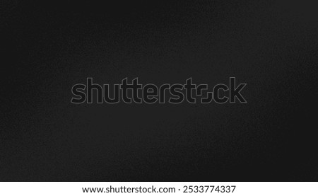 Understated grainy texture set against a dark backdrop
