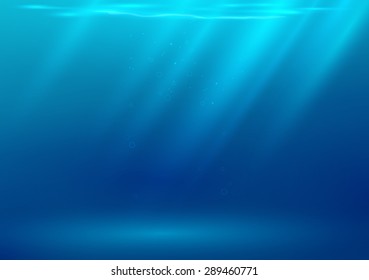 Underwater background with sun rays. Space for text or object.