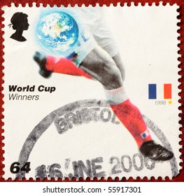 UNITED KINGDOM - CIRCA 2006: A Stamp Printed In United Kingdom Shows Soccer Player Legs And France State Flag With The Inscription 