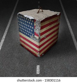 United States Government Shutdown Roadblock Obstacle Business Concept With A Cement Or Concrete Cube With An Old American Flag Blocking A Road Or Highway As An Icon Of Political Gridlock And Embargo.