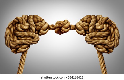 United thinking concept as an alliance for ideas exchange and common agreement as two brains made of rope tied together as a symbol for cooperation.