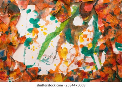 Unusual frame made of torn pieces of painted wet paper, in the artist's studio. Abstract background with creative drawing for your creative design or illustrations. - Powered by Shutterstock