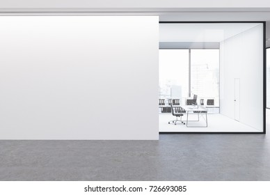 Upscale CEO office with white and glass walls in an office area with a panoramic window. A large blank wall fragment. 3d rendering mock up