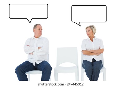 Upset couple not talking to each other after fight against speech bubble - Powered by Shutterstock