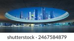 An urban skyline at night, seen through an architectural circular opening. 3D rendering