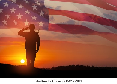 USA army soldier saluting on a background of sunset or sunrise and USA flag. Greeting card for Veterans Day, Memorial Day, Independence Day. America celebration. 3D-rendering. - Powered by Shutterstock