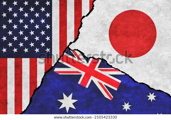 USA,\
Australia and Japan painted flags on a wall with a crack. United\
States of America, Japan and Australia\
relations