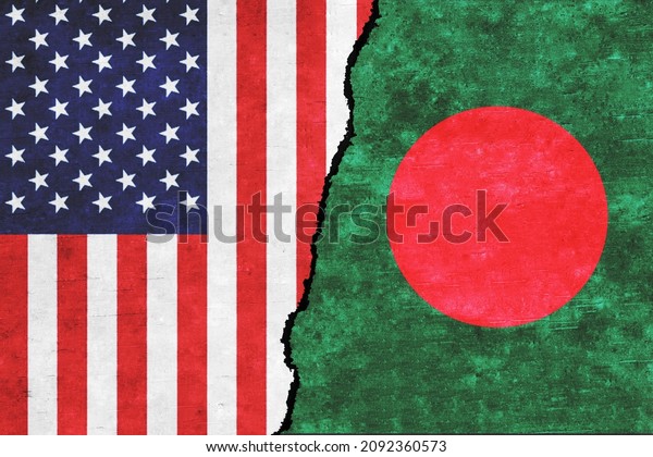 USA and Bangladesh painted\
flags on a wall with a crack. USA and Bangladesh conflict.\
Bangladesh and United States of America flags together. USA vs\
Bangladesh