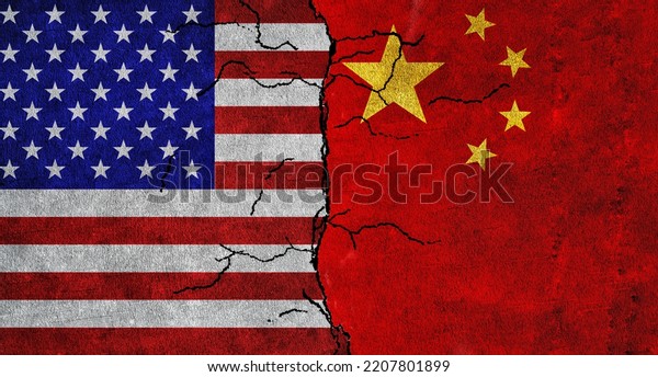 USA and China flag\
together on a cracked wall. China and United States of America\
diplomatic relations