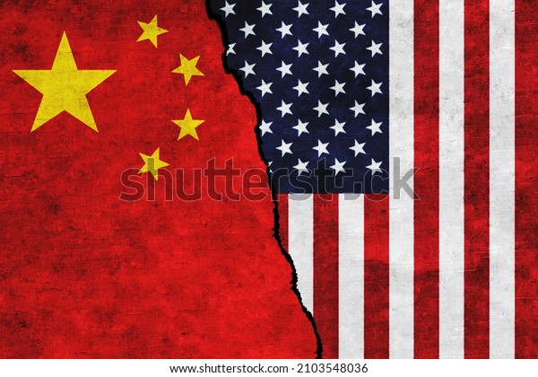 USA and China painted flags on a wall with a\
crack. China and United States of America relations. USA and China\
flags together