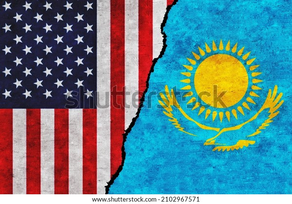 USA and Kazakhstan painted flags on a wall with\
a crack. United States of America and Kazakhstan relations.\
Kazakhstan and USA flags\
together