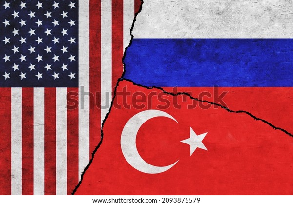 USA,\
Russia and Turkey painted flags on a wall with a crack. United\
States of America, Turkey and Russia\
relations