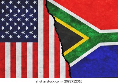 USA and South Africa painted flags on a wall with a crack. USA and South Africa conflict. South Africa and United States of America flags together. USA vs South Africa