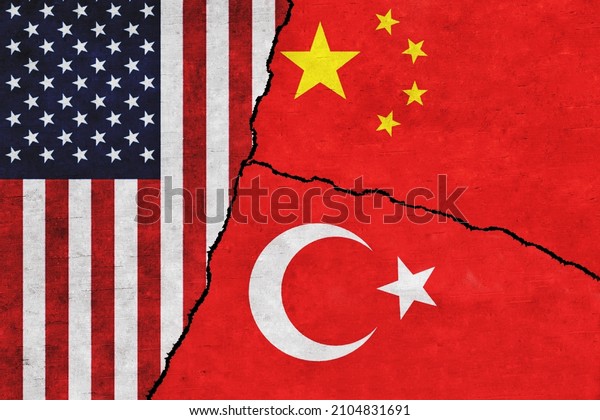 USA, Turkey\
and China painted flags on a wall with a crack. Turkey, United\
States of America and China\
conflict