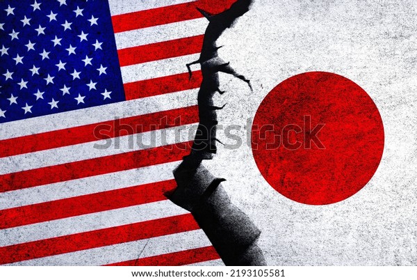 USA vs Japan concept flags on\
a wall with a crack. United States of America and Japan political\
conflict, war crisis, economy relationship, trade\
concept
