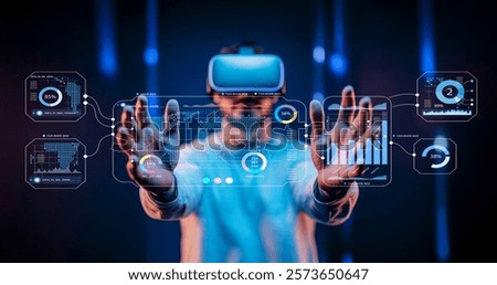 A user wearing a virtual reality headset reaches out to interact with digital data visualizations in a futuristic environment, highlighting advanced technology and immersive experiences.