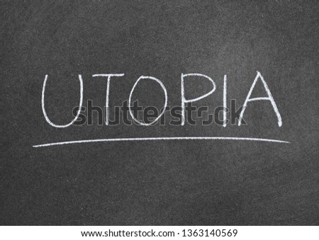 utopia concept word on blackboard background