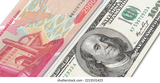 Uzbekistani Soum And US 100 Bill. Close Up Uzbekistan Banknotes And US Banknotes