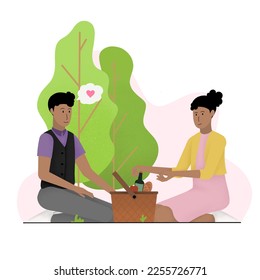 Valentines day couple having a picnic by the park - Powered by Shutterstock