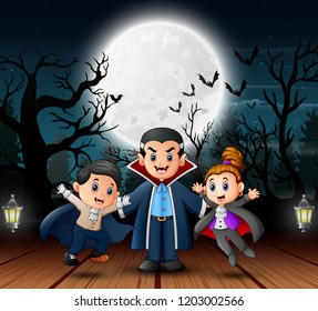 Vampire Family In The Halloween Day Outdoors At Night