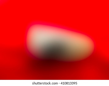 The variocolored blurred background and texture.