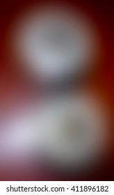 The variocolored blurred background and texture.