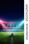 Vertical image. 3D render of soccer stadium with soccer ball resting in center of a brightly lit arena with cheering crowd on background. Concept of sport, tournament, championship, game, event