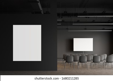 Vertical Mock Up Poster Frame Hanging In Modern Office Lecture Hall With Dark Grey Walls, Concrete Floor And Rows Of Gray Chairs Near Projection Screen. 3d Rendering