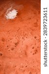 Vertical view of Mars surface featuring white polar ice cap and dense impact craters. Realistic Martian terrain suitable for mobile wallpapers and space education in Ultra HD 8K. 3D Illustration