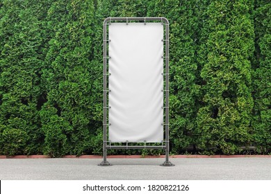 Vertical Vinyl Banner On Metal Frame Mockup. 3D Rendering.