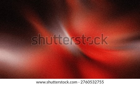Vibrant abstract image featuring deep red and black swirls with motion blur, evoking energy and fluid movement in dark ambiance.