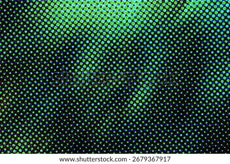Vibrant halftone pattern with blue and green dots on a dark background, ideal for digital art, retro designs, or tech visuals
