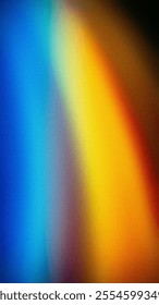 A vibrant vertical gradient blending blue, yellow, and orange hues with a grainy texture. Ideal for dynamic wallpapers, banners, and creative backdrops, adding energy and contrast