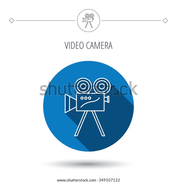 Video camera with reel icon.\
Retro cinema sign. Blue flat circle button. Linear icon with\
shadow. 