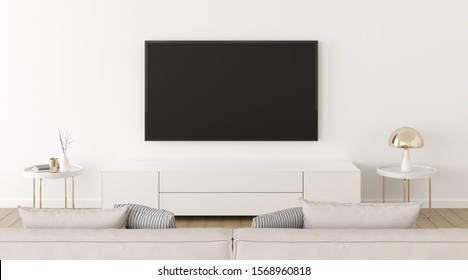 View Of White Living Room In Minimal Style With Television And Gold Lamp, Interior Design With TV And Cabinet On White Wall, 3d Rendering.	